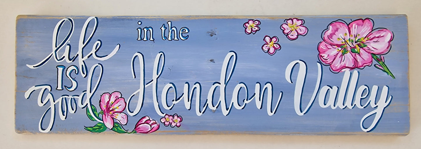 Wooden garden text signs